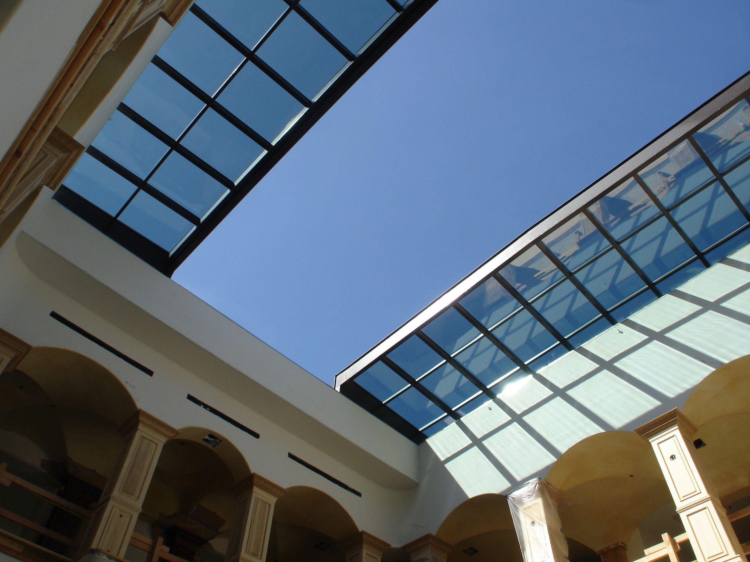 Self Contained Atrium Retractable Roof System for Residential Atriums | Rollamatic